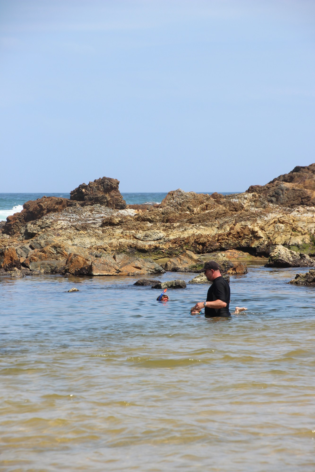 Snorkelling the rock pools at the creek entrance, Station Creek